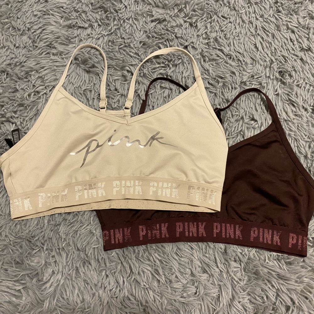 2 pink bras